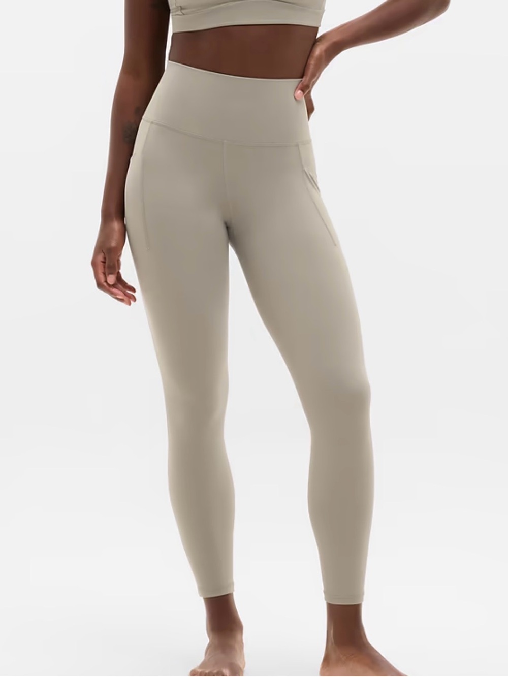 Athleta Salutation Stash leggings in a blue/gray color-small